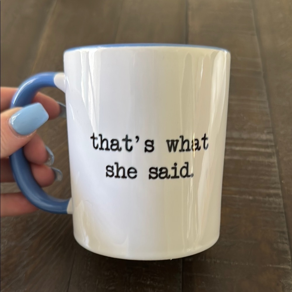 Quirky White Mug with Blue Handle